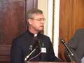 Sen. Kennedy with religious leaders discussing minimum wage