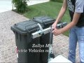 videos de veicoli elettrici Zallys M4 con gancio per bidoni