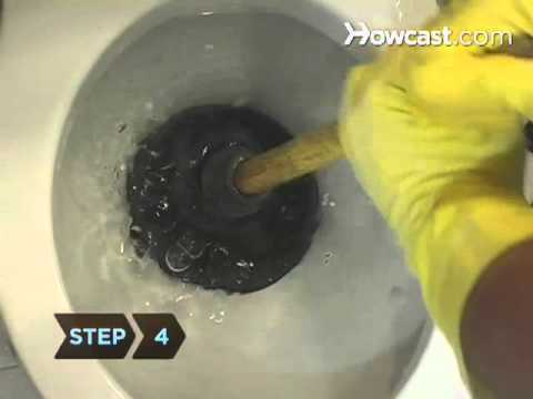 how to unclog a toilet with a cup plunger