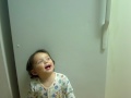 i created this video using my logitech quickcam software ... lily crackin up about hitting herself against frig baby 