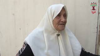 هوية - الحاجة عطرة سعيد نايف كعوش - قرية ميرون: تتحدث عن الحياة بلدتها ميرون