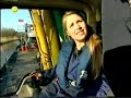 I learn a blond girl working with a digging machine