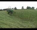 Using a crimper to flatten cover crops