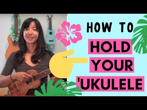 how to hold a ukulele properly