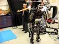 Japanese robot master tests American humanoid robot Sarcos