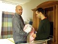 Me nervously holding a baby