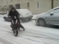 Adrien et son scoot sous la neige