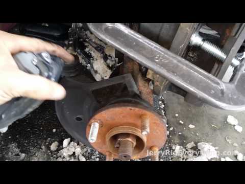 01-06 Nissan Sentra Brake Pad and Rotor Replacement Video (How to fix squeeky brakes)