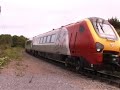 A VIRGIN VOYAGER TRAIN DEPARTS FROM WATCHET ON THE WEST SOMERSET RAILWAY UK IN MAY 2003