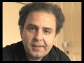 philippe a�che, 1er violon solo de l'orchestre de paris, ouvre la partition de l'internet eroica symphony de tan dun et analyse la partie de violon.