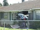 Ford Taurus vs House So Cedar St, Tacoma, WA