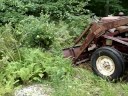 1958 IH 340 Utility Tractor w/ plow on. 1958 IH 340 Utility Tractor w/ plow on.