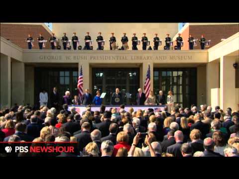 bush - Presidents Barack Obama, George W. Bush, Bill Clinton, George H.W. Bush, and Jimmy Carter and their wives all attended the opening of the newest presidential...
