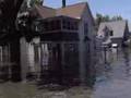 Boat tour of downtown Cedar Rapids, Iowa streets