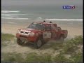 clipe com imagens do rali paris dakar de 2002 e 1998