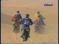 clipe com imagens do rali paris dakar de 2002 e 1998