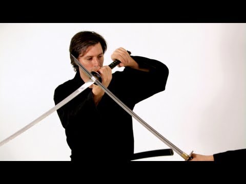 Parry'' - See what you can learn on the go with the new Howcast App for iPhone and iPad: http://bit.ly/11ZmFOu Watch more How to Do Katana Sword Fighting videos: http:...