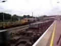 EWS class 92 passes GBRF 66 both on slow lines at huntingdon