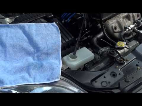 how to drain coolant overflow tank
