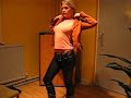 Blonde girl in tight leather look pants Blonde girl in tight leather look pants