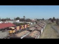 An empty QR National coal train passes through Oakey en route to Macalister where it will be loaded and subsequently return to the port of Brisbane. The locomotives are Clyde/EMD 2300 class units numbered 2332 & 2366.