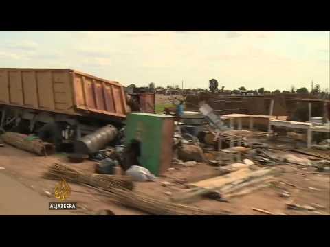 South sudan - Rebel gunmen carried out attacks in Bentiu after capturing the town from government control. The UN has said that at least 200 people have been killed. Subscribe to our channel http://bit.ly/AJSub...