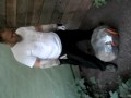 115 kg (254 lbs) stone held with one arm