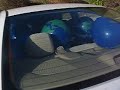 car filled with balloons