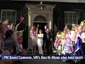 Royals Will, Kate welcome torch at Buckingham Palace