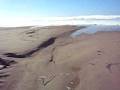 videos de Waves Roll Ashore onto Morro Bay sand spit beach