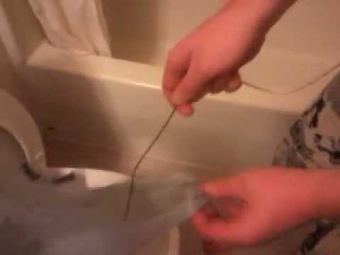 how to unclog toilet with a hanger