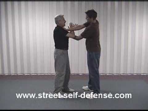 Self Defense - Against a double collar (lapel) attack.