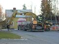 Loading Cat 320C on Trailer