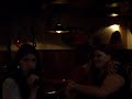 my friend therese in a karaoke bar with another girl named louisa singing the danish 