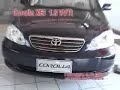 MOTORES & A��O - MERCHAN COROLLA E FIELDER - AGOSTO
