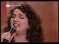 Early clip of the young Dulce (before the hair cut ! ) singing her gratest hit , in 1995 at the portuguese TV. A different version, with the original lyrics , of Amalia's hit: Solidao. As a matter of fact this is the 