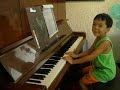 6 year old piano: Cush plays something