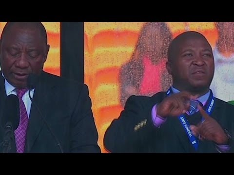 language - Some believe the sign language interpreter at Nelson Mandela's Tuesday memorial was a fake. Errol Barnett reports.