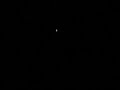 Unidentified object hovering at tree line  over Southwick/Granville Massachusetts Friday, April 18th 2008 around 11pm.Please Note: This object was actually stationary. I was filming with my Canon G7 point and shoot camera without a tripod and my hands were jumping around. Also, please excuse some of the background language. We were all very excited :)The voices you hear in the background are my friend Dan, Bridget, their new neighbor, my husband Mike, and me behind the camera.