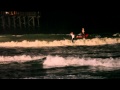 Surfing under a full... View Video