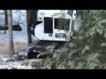 videos de Timbco 425 with Quadco Hot Saw working steep slope