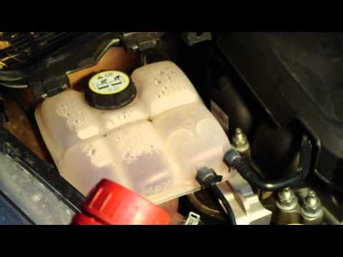 how to drain coolant from ford escape