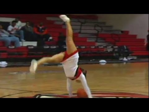 WATCH: This Cheerleader Performs The Best Trick Shot EVER!