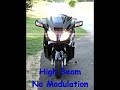 Burgman 650 Exec Headlight Modulators Installed