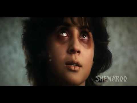 12va - Vishal (Ajay Devgan) and Swati (Urmila Matondkar) are a young urban couple who find an apartment in a high rise building. Despite the rumors that the house i...