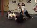 Man v Woman tournament grappling match (nice flying arm bar)