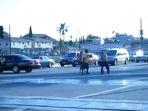 Long Beach - filmed on the corner of Anaheim and Long Beach Blvd. The guy in the wife beater seemed drunk and was walking carelessly in traffic and stopped the guy in the...