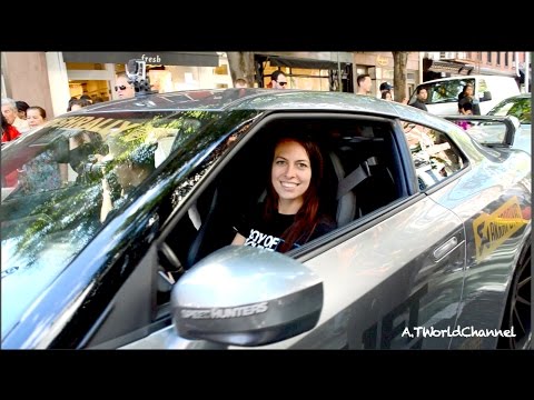 girls revving - Is this the kind of hot car girl you like? A beautiful brunette revving and driving the Nissan GT-R Godzilla during the rally. Follow my Facebook Page for ph...