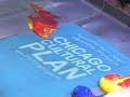 Artist Chris Drew screenprinting at Art Rally Daley Plaza
