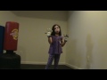 Thaissa teaches Taekwondo with gloves, respiration, and counting in Korean